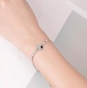Bracelet Femme avec un Trèfle à Quatre Feuilles 2