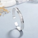 Bracelet ouvert en plume pour femme 5