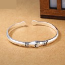 Bracelet ouvert femme mains liées 1