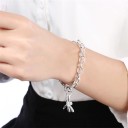 Bracelet pour femme avec de grands maillons et une libellule 2