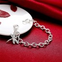 Bracelet pour femme avec de grands maillons et une libellule 5