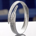 Bracelet rigide femme plume 1