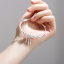 Bracelet rigide pour femme avec attrape-rêves 6