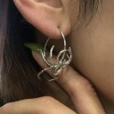 Brincos circulares femininos com aranha 2
