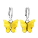 Brincos circulares femininos com borboleta C1097 34