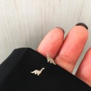 Brincos de pressão de dinossauros 6