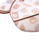 Bryndák pro miminka a batolata 30 x 25 cm Rukávky přes ramena Vzor pečiva na krémovém podkladu Kakaové lemování a kapsa na zbytky jídla 3