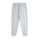 Calças de treino unisex de cor sólida com cintura elástica e cordões ajustáveis, complementadas com bolsos laterais e punhos 22