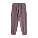 Calças de treino unisex de cor sólida com cintura elástica e cordões ajustáveis, complementadas com bolsos laterais e punhos 12