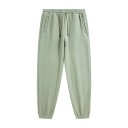 Calças de treino unisex de cor sólida com cintura elástica e cordões ajustáveis, complementadas com bolsos laterais e punhos 23