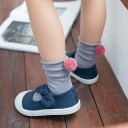 Calcetines de niña con pompón 2