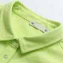 Camicia lunga da donna in verde lime Taglio oversize ampio con spalle scese Chiusura con bottoni metallici Colletto classico Poliestere 3