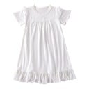 Camisa de noche infantil de corte acampanado con mangas cortas de vuelo, con canesú fruncido, un pequeño lazo y volantes en el borde inferior 6