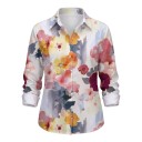 Camisa feminina de manga longa com grandes flores pintadas em fundo claro, com colarinho clássico e botões por toda a parte da frente 4
