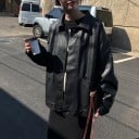 Casaco oversized feminino em imitação de pele Preto Ombros caídos Gola dobrável Duas bolsas frontais Superfície estruturada Para saias e calças 2