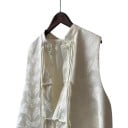 Chaleco jacquard femenino de estilo chino con cuello alzado y botones decorativos de nudos con largas cintas y aberturas en los lados 9