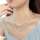 Charmante dubbele ketting Parels en vlinderontwerp Zinklegering Licht luxueuze glanzende sieraden voor vrouwen Feest modeaccessoire 1