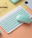 Clavier mini sans fil avec connexion Bluetooth Construction compacte et fine Batterie lithium Disposition QWERTY Touches îlot 6