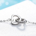 Colar feminino com corações entrelaçados M94 4