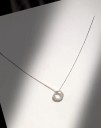 Collana da donna con pendente circolare color argento 2