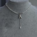 Collar de cuentas facetadas con colgante en forma de animal estilizado y cadena colgante, joya decorativa llamativa 1