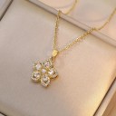 Collier avec pendentif floral d'environ 15 mm avec des pierres taillées, chaîne de 40 + 5 cm, motif décoratif délicat avec des feuilles 3