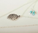 Collier doré avec plume J3402 5