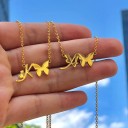 Collier femme lettre et papillon 1