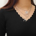 Collier pour femmes avec globe terrestre et anneaux 4
