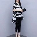 Completo donna blusa e pantaloni Blusa ampia con scollatura a V e orlo asimmetrico Motivo ondulato bianco e nero Pantaloni neri accorciati 3