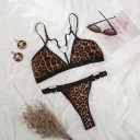 Completo donna di lingerie: reggiseno e perizoma con motivo leopardato Anelli metallici Fasce decorative Bordo nero Spalline sottili Cotone 2