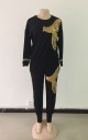 Completo donna felpa e pantaloni con decorazione dorata lucida Completo nero con maniche lunghe e collo rotondo Poliestere e cotone 2