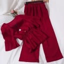 Completo femminile in due pezzi blusa e pantaloni larghi con elastico Scollo a V con bottoni Punto vita arricciato con volant Maniche 2