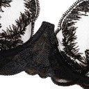 Completo intimo femminile nero con reggiseno semi-trasparente con ferretti e motivo ricamato a piuma e perizoma con bretelle regolabili 6