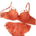 Conjunto de lencería para mujer sujetador con aros y copas acolchadas con cintas decorativas y bragas transparentes de malla 7