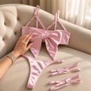 Conjunto de lingerie feminino de três peças com soutien com grande laço e decote em tiras, fio dental com laterais ajustáveis e ligas 5