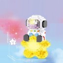 Construcción astronauta 9,8 x 7,0 x 4,2 cm Astronauta sentado en estrella dorada 387 piezas Bloques mini transparentes amarillos Decoración espacial detallada 2