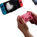 Controler wireless pentru Nintendo Switch cu conexiune Bluetooth, două joystick-uri, cruciș și butoane A, B, X și Y 3