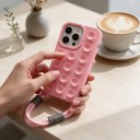 Coque en silicone avec ventouses et dragonne pour iPhone 17 Finition antidérapante Reste sur surface lisse Pour vidéos et photos 24