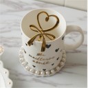 Cucchiaino con cuore e fiocco 2