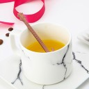 Cucchiaio a forma di chitarra 3