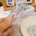 Custodia protettiva per caricabatterie Apple 18W/20W con decorazione a fiocchi, set con guaina, tappi e fascetta 7