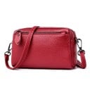 Dam liten crossbody väska i rektangulär form Äkta läder med grynig yta Rem med karbinhakar Stängning med dragkedja 17 x 10 x 5 cm 2