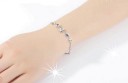 Damarmband med stenar och blommor 4