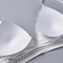 Dame blonder bh med trekantede skåle Udtagelige indlæg Bredt hulmønster Bomuld og nylon Omkreds under brystet 62 til 77 cm 10
