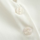 Dame elegant ensfarvet vest med V-udskæring Knaplukning Stilfuld polyesterbluse uden ærmer Forskellige farver 3