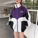 Dame oversize jakke med farveblokke Ståkrave og lynlås Pålidelige manchetter og nederste kant Sportslig løs pasform af polyester 3