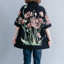 Dame oversize sweatshirt med krave Sort med stort blomsterprint Brede ærmer til albuen Sidelommer Slids i siderne Polyester 5