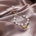 Dame pull-up armbånd med perle H504 2