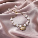 Dame pull-up armbånd med perle H504 3